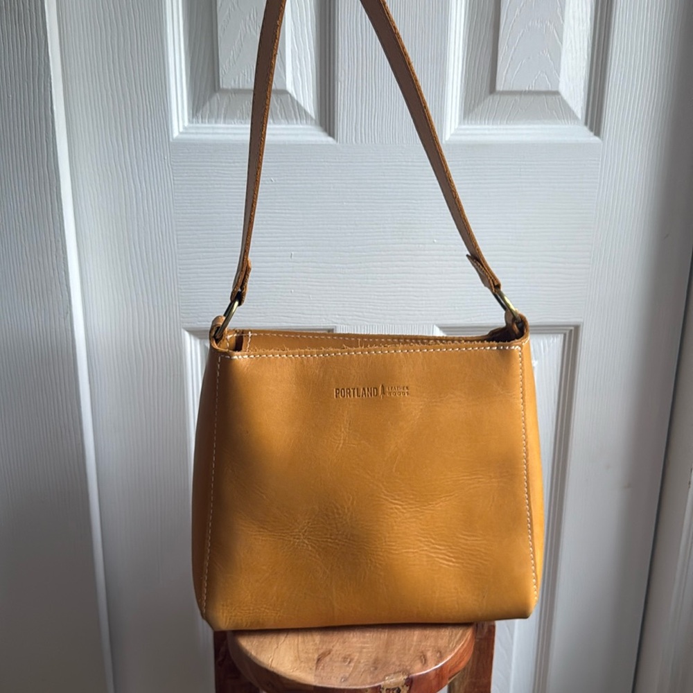 Portland leather triangle shoulder bag